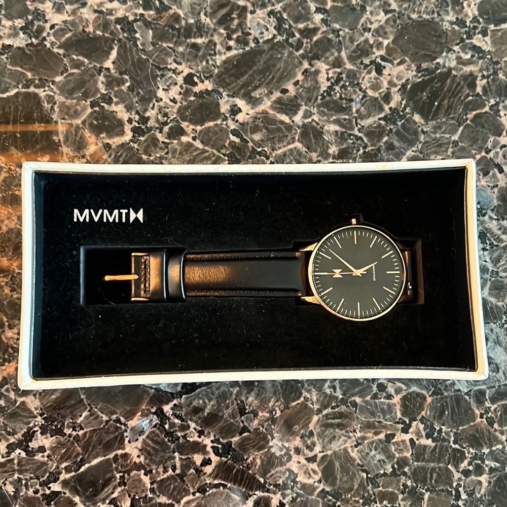 New black and rose gold MVMT watch